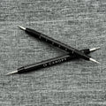 Two Canopy spring bar tools with forked and pin ends for strap changes